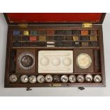 An early 19th century Reeves & Woodyer watercolourist's boxed set with fitted drawer and watercolour