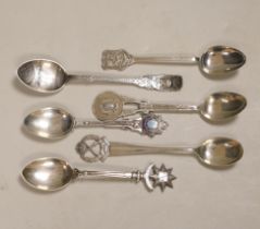 A Roald Amundsen commemorative .830 silver spoon, circa 1911, and five other commemorative spoons,