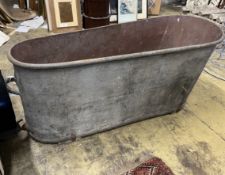 A vintage French galvanised bath, length 150cm, height 60cm