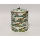 An early 20th century Chinese enamelled porcelain four section stacking food container and cover,