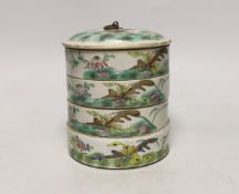 An early 20th century Chinese enamelled porcelain four section stacking food container and cover,