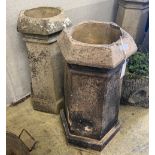 A pair of hexagonal terracotta chimney pots, larger height 71cm