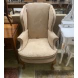 A George I style wing armchair upholstered in faux suede fabric, width 78cm, depth 70cm, height