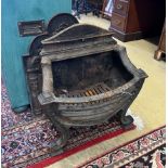 A 19th century cast iron bow front fire grate, width 56cm, depth 28cm, height 61cm together with a