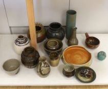 A large collection of mixed studio pottery vases, bowls and dishes,