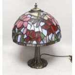 A reproduction Tiffany lamp, leaded glass shade with floral decoration and dragonflies, 40cm