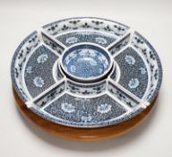 A Chinese porcelain blue and white lazy Susan or supper dish set, 38cm high