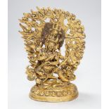 A Sino Tibetan gilt bronze figure of Mahakala, 23cm