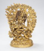 A Sino Tibetan gilt bronze figure of Mahakala, 23cm