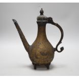 An Indian Islamic brass ewer, 27cm high