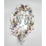 A 19th century French or German floral encrusted 3 sconce wall mirror, 48cm long
