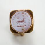 A 19th century novelty gold, coral and sardonyx mounted fob seal, modelled as a spotlight, the