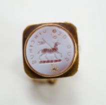 A 19th century novelty gold, coral and sardonyx mounted fob seal, modelled as a spotlight, the