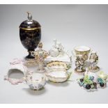 A group of mostly German porcelain including a Meissen flower encrusted cup