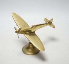 A brass model of a spitfire, 18cm wide