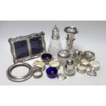 Sundry small silverwares including spill vase, napkin rings, casters, photograph frames, etc.