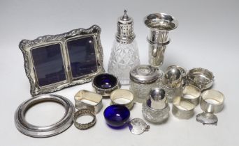 Sundry small silverwares including spill vase, napkin rings, casters, photograph frames, etc.