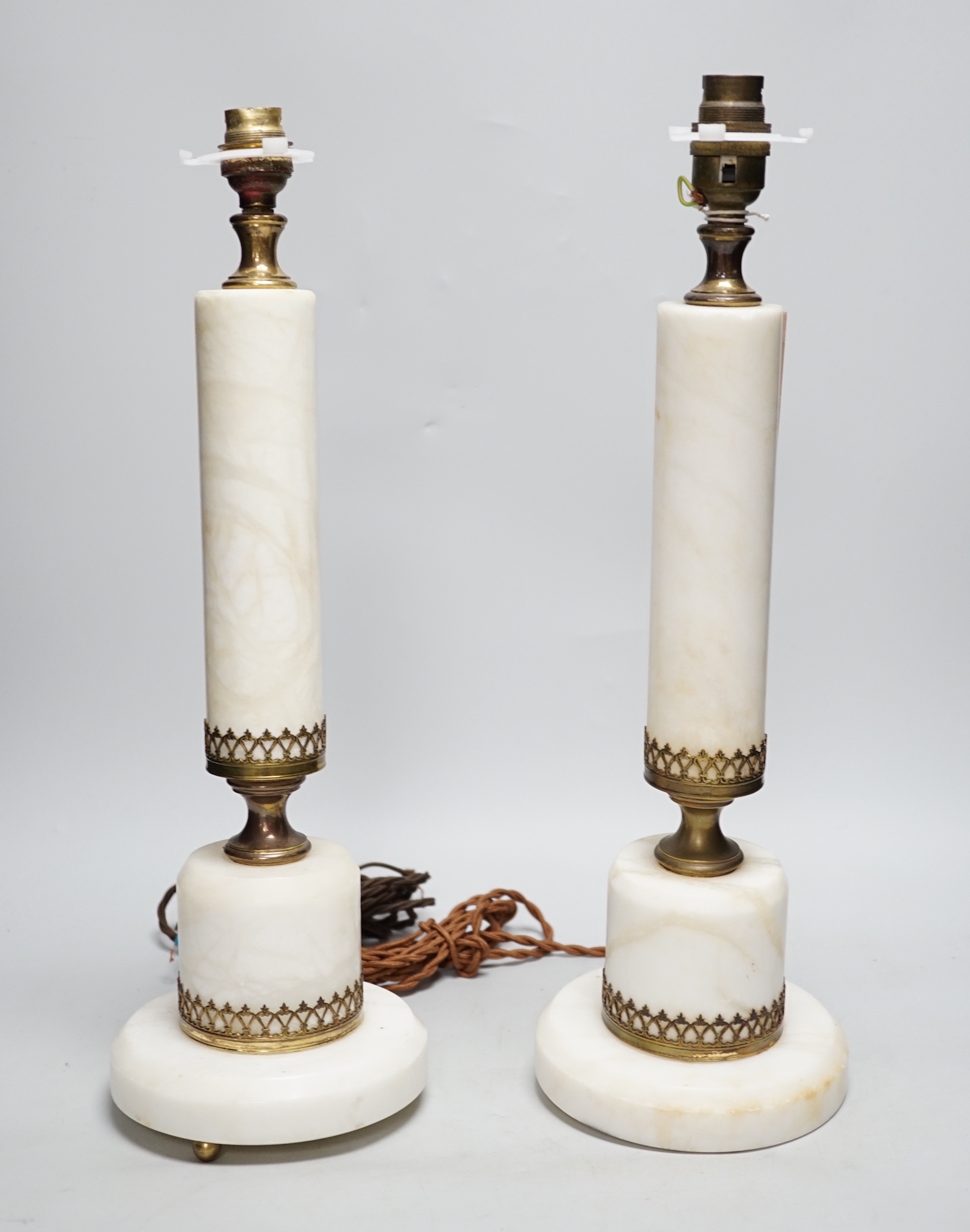 A pair of white marble column table lamps with gilt metal mounts and shades, 61cm high overall - Image 4 of 4