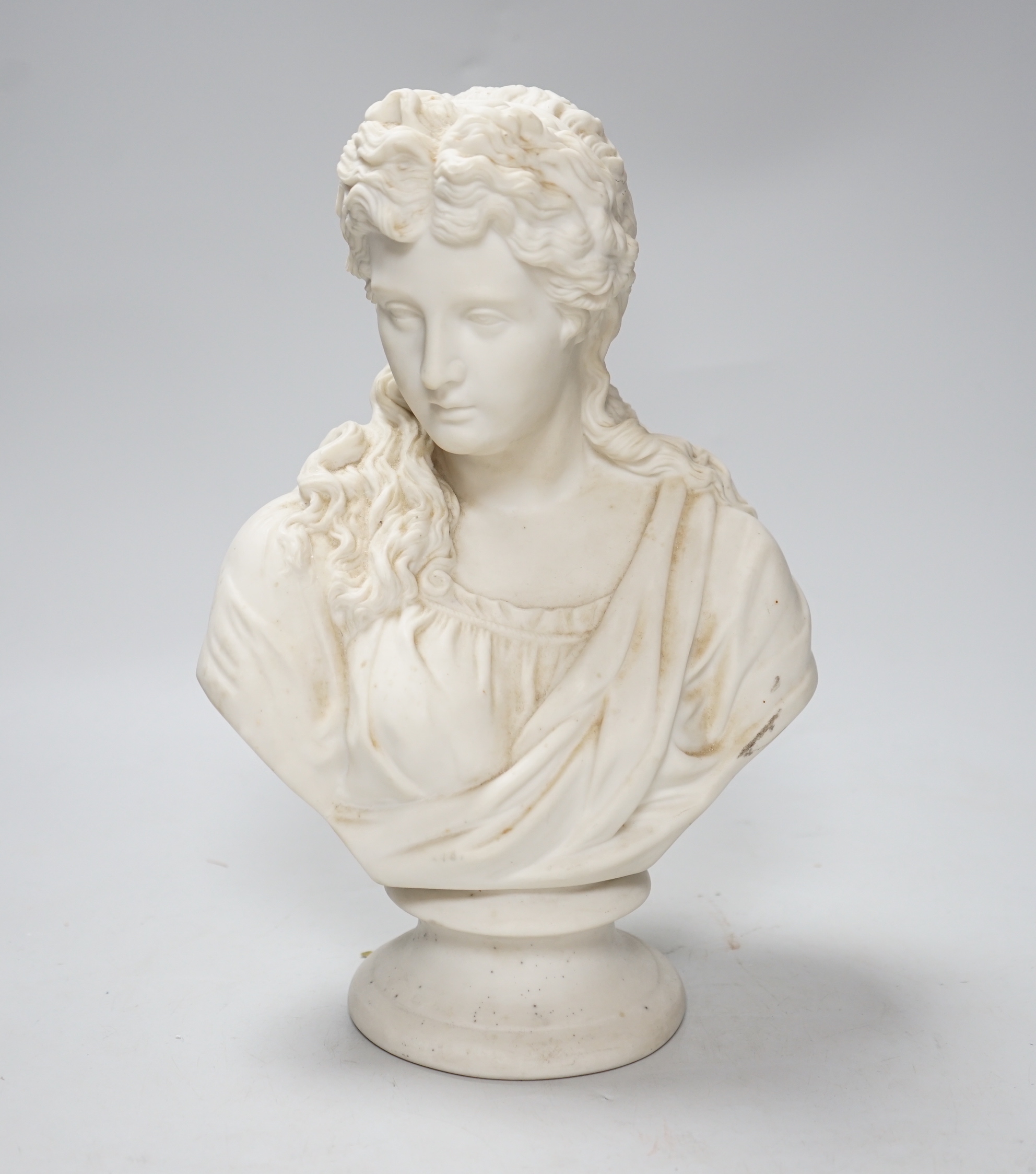 A Victorian parian bust of a lady, 28cm