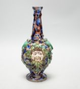 A Palissy style ‘Bacchus’ flask, base impressed ‘LA’, 24.5cm