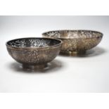 Two 19th century Chinese pierced white metal bowls, largest diameter 28.4cm, 22.7oz.