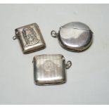 Three assorted late 19th/early 20th century silver vesta cases, including circular 50mm.