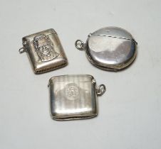 Three assorted late 19th/early 20th century silver vesta cases, including circular 50mm.