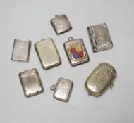 Three assorted silver vestas cases including Victorian set with a sapphire, 39mm and five other