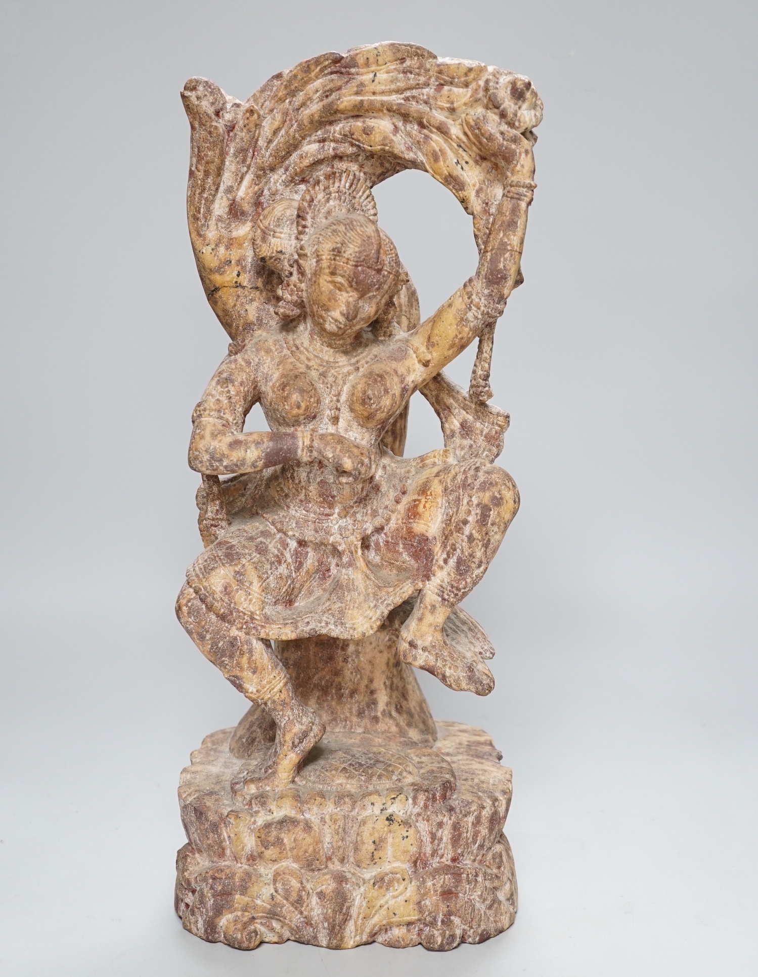 An Indian carved marble dancer, 40cm