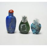 Thee Chinese hardstone snuff bottles, in spinach green Jade, lapis lazuli and turquoise matrix,