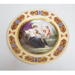 A late 19th century Vienna plate, with shield to reverse, 24cm
