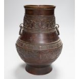 A Chinese archaistic bronze vase, hu, Xuande mark, 19th century, 24cm high