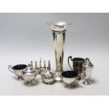 A George V silver three piece condiment set by Edward Barnard & Sons Ltd, London, 1916, two other