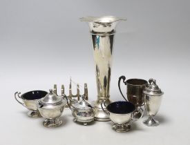 A George V silver three piece condiment set by Edward Barnard & Sons Ltd, London, 1916, two other