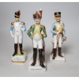 Twenty porcelain figures of soldiers including Officer Light Dragoon and Rifle Brigade, largest 31cm