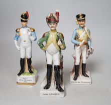 Twenty porcelain figures of soldiers including Officer Light Dragoon and Rifle Brigade, largest 31cm