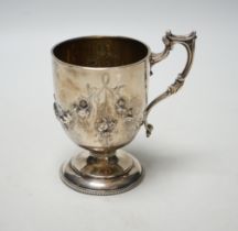 A Victorian embossed silver pedestal christening cup, Joseph Angell II, London, 1860, height 11.7cm,