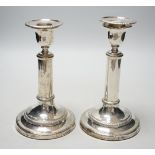 A pair of George III silver candlesticks, with cylindrical stems, John Roberts & Co, Sheffield,