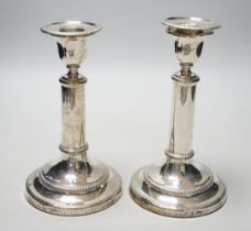 A pair of George III silver candlesticks, with cylindrical stems, John Roberts & Co, Sheffield,