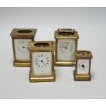 Four carriage clocks in varying sizes, tallest 12cm high