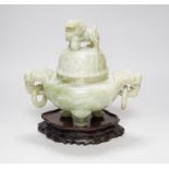 A large Chinese bowenite jade censer and cover on carved hardwood stand, 21cm wide