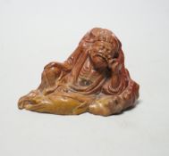 A 19th century Chinese soapstone figure of a Luohan, 12cm wide