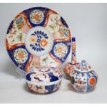 Nine Japanese Imari pieces including; a charger, lidded pot, a bowl, four small gourd vases, two