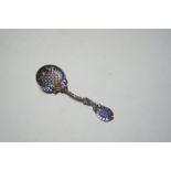 An early 20th century Norwegian 925 and polychrome enamel set sifter spoon, 11.3cm.