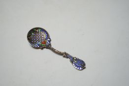 An early 20th century Norwegian 925 and polychrome enamel set sifter spoon, 11.3cm.