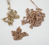 Three 19th century gilt metal chains, including a guard chain, 138cm.