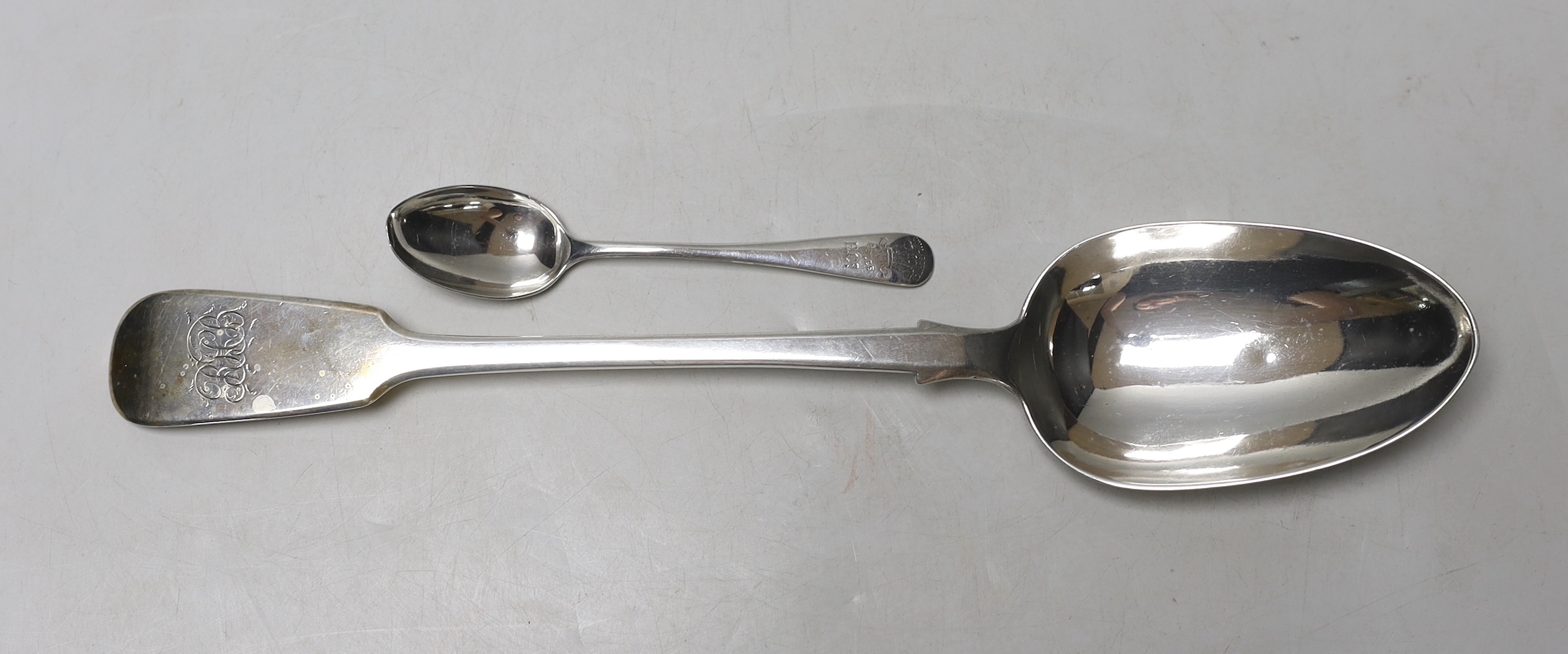 A Victorian silver fiddle pattern basting spoon, London, 1844, 32cm and a silver teaspoon, 4.8 oz.