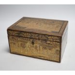 A 19th century Chinese export lacquer tea caddy, black ground with gilt decoration, containing a