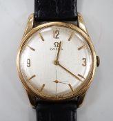 A gentleman's 1960's 9ct gold Omega manual wind wrist watch, with engraved inscription and