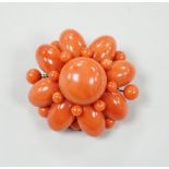 A yellow metal mounted graduated coral bead circular cluster brooch, 48mm, gross weight 34.8 grams.
